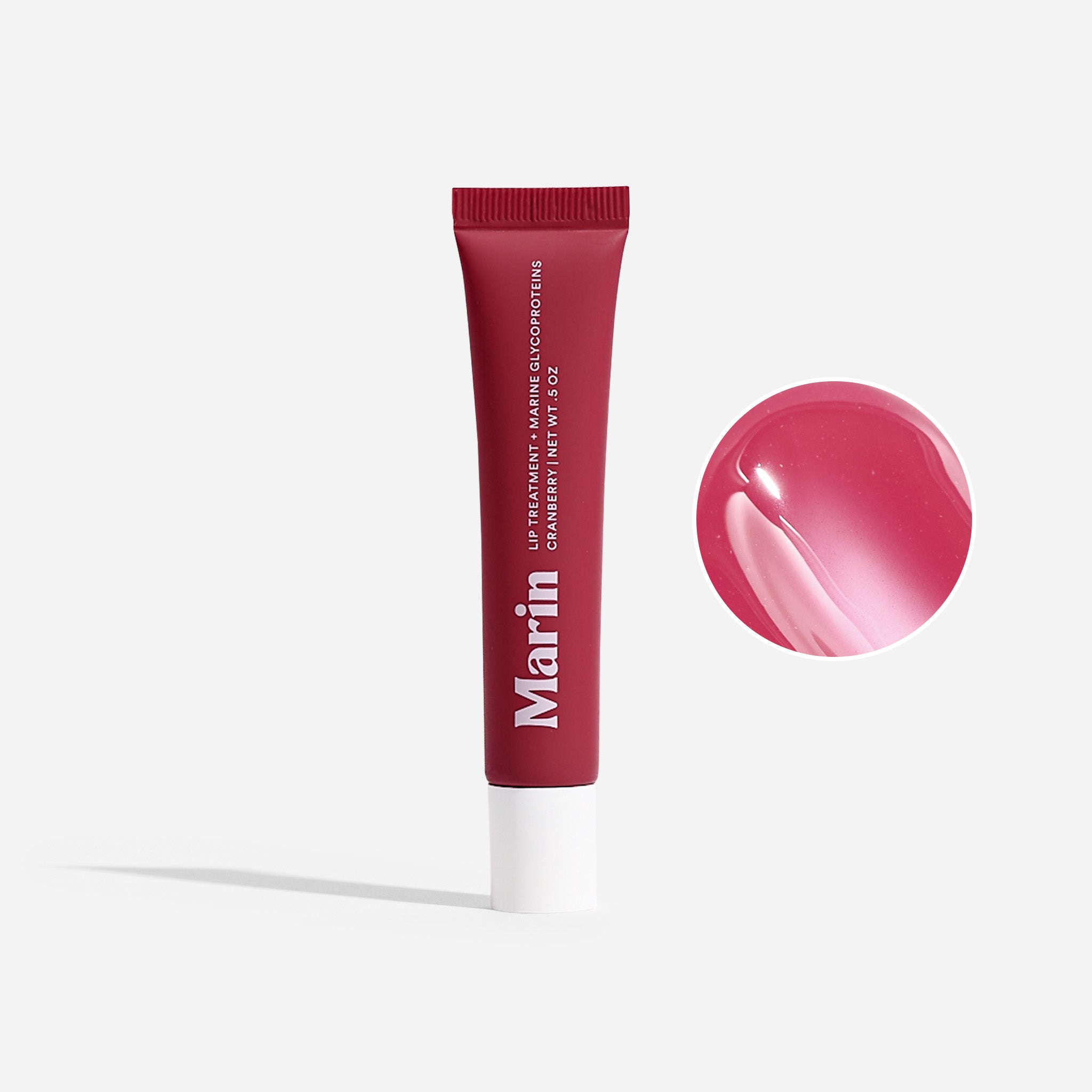 Red skincare tube labeled 'Marin' with a pink product swatch to the right on a white background.