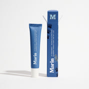 Blue lip tube and box labeled 'Marin' with 'M' logo - text: Lip Treatment Blueberry French Toast