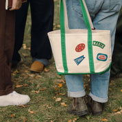 Canvas tote with green trim and four collegiate-style patches reading MARIN, Blue, GLYCO PROTEINS