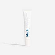 Marin lip treatment white tube labeled LIP TREATMENT + MARINE GLYCOPROTEINS UNSCENTED NET WT. 0.5 OZ