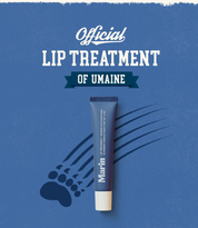 Official LIP TREATMENT OF UMAINE - Marin lip treatment tube on blue background, flavor BLUEBERRY FRENCH TOAST