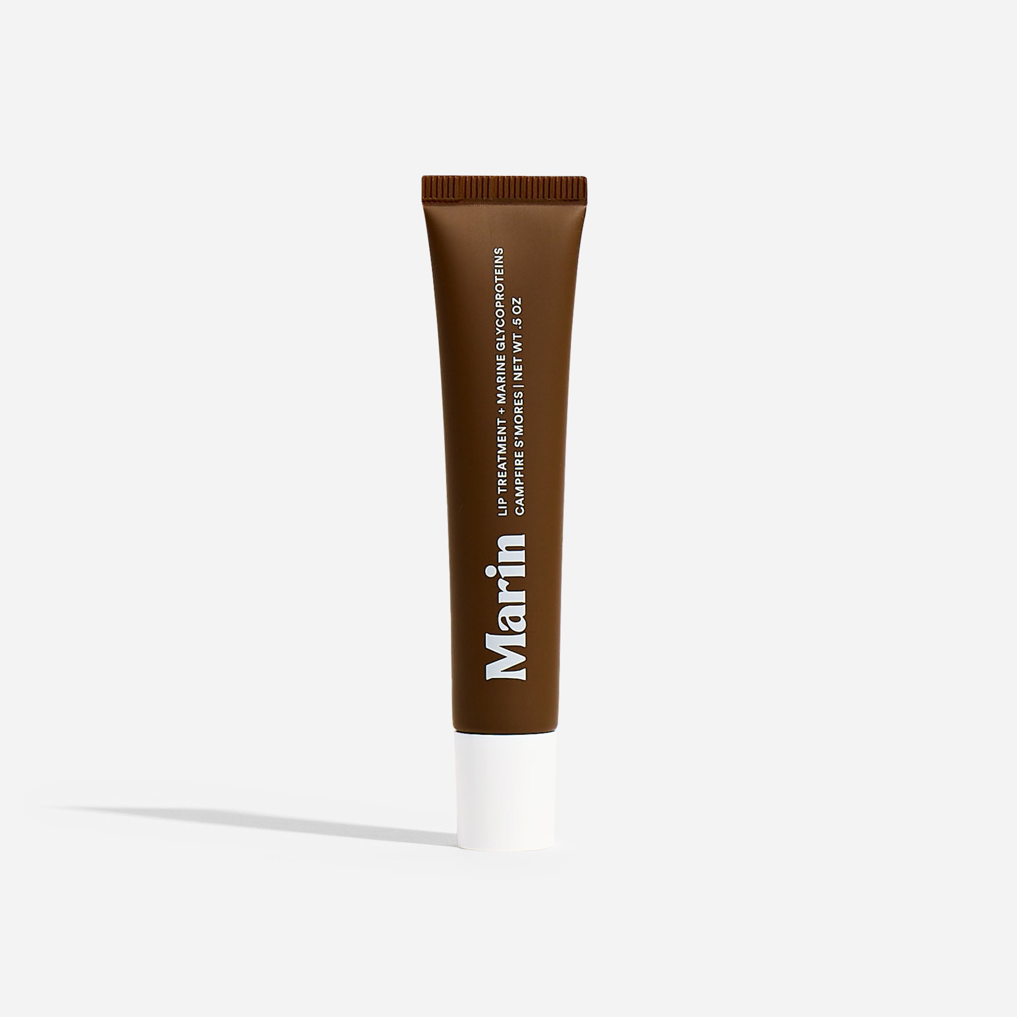 Marin Skincare Campfire S'mores lip treatment in brown squeeze tube with white cap
