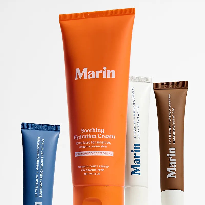 Four Marin tubes; orange tube labeled 'Soothing Hydration Cream' with blue, white, and brown tubes behind